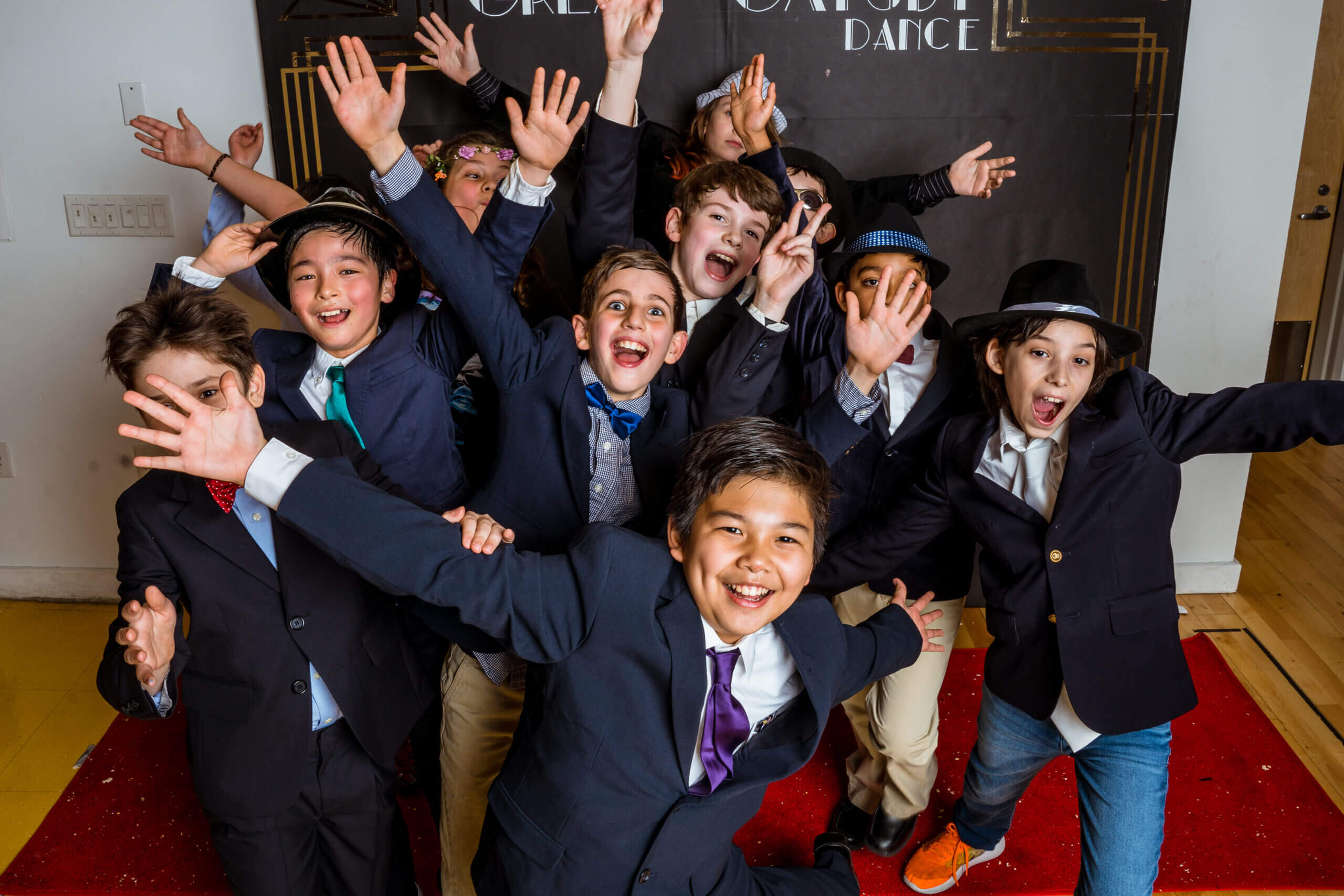 Students posing for photo at school dance.